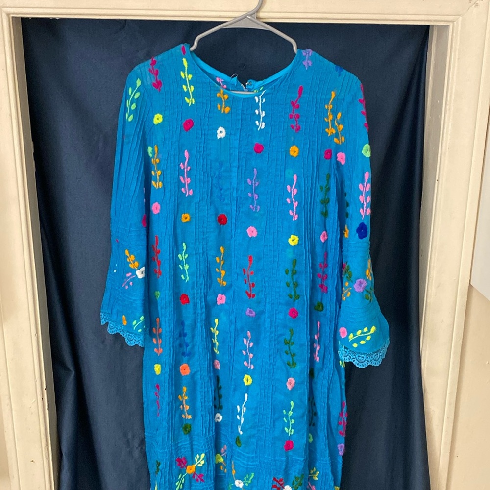 Bright blue sheer maxi dress with flowing sleeves